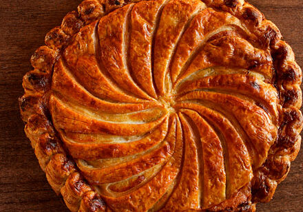 Golden house-made pastry with a spiral scored crust